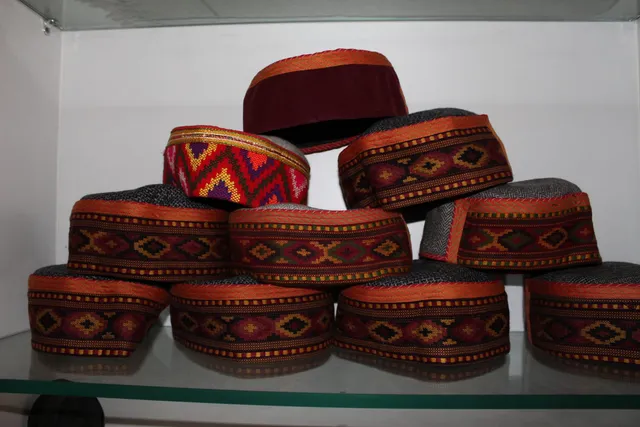 Photograph 5 of 28 from Thakur Ramsingh Ji's personal archive: his belongings and memorabilia on display shelves.