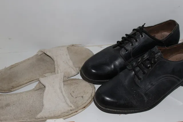 Photograph 8 of 28 from Thakur Ramsingh Ji's personal archive: his belongings and memorabilia on display shelves.