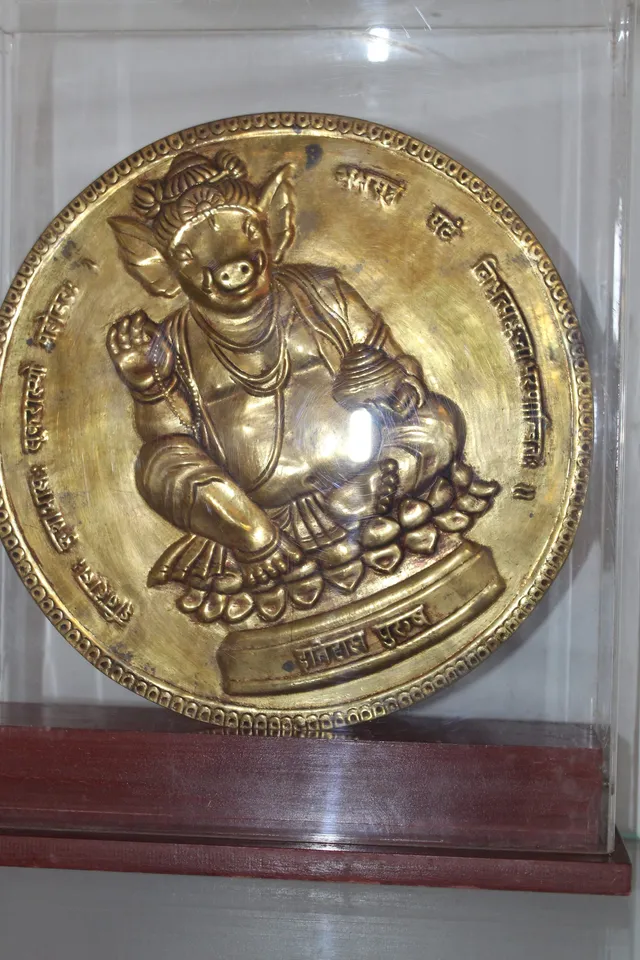 Photograph 21 of 28 from Thakur Ramsingh Ji's personal archive: his belongings and memorabilia on display shelves.