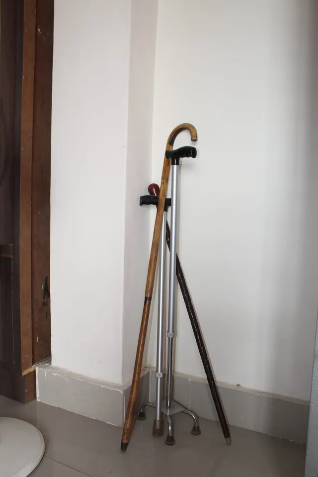 Photograph 26 of 28 from Thakur Ramsingh Ji's personal archive: his belongings and memorabilia on display shelves.